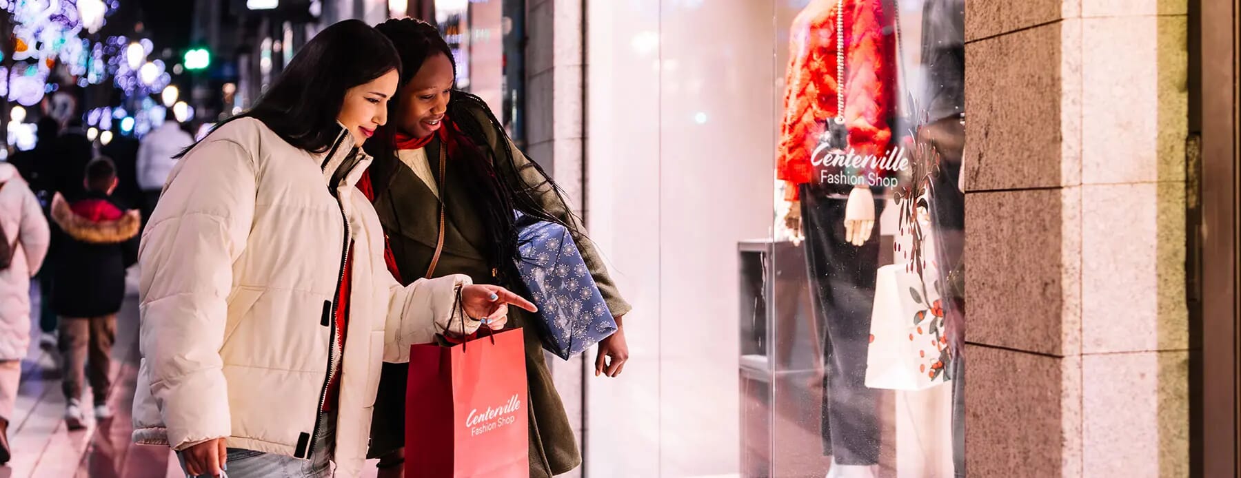 Two women shopping during small business saturday