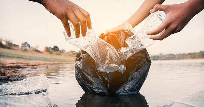 Volunteers picking up plastic to recycle