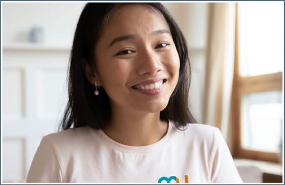 woman wearing a t-shirt with company logo