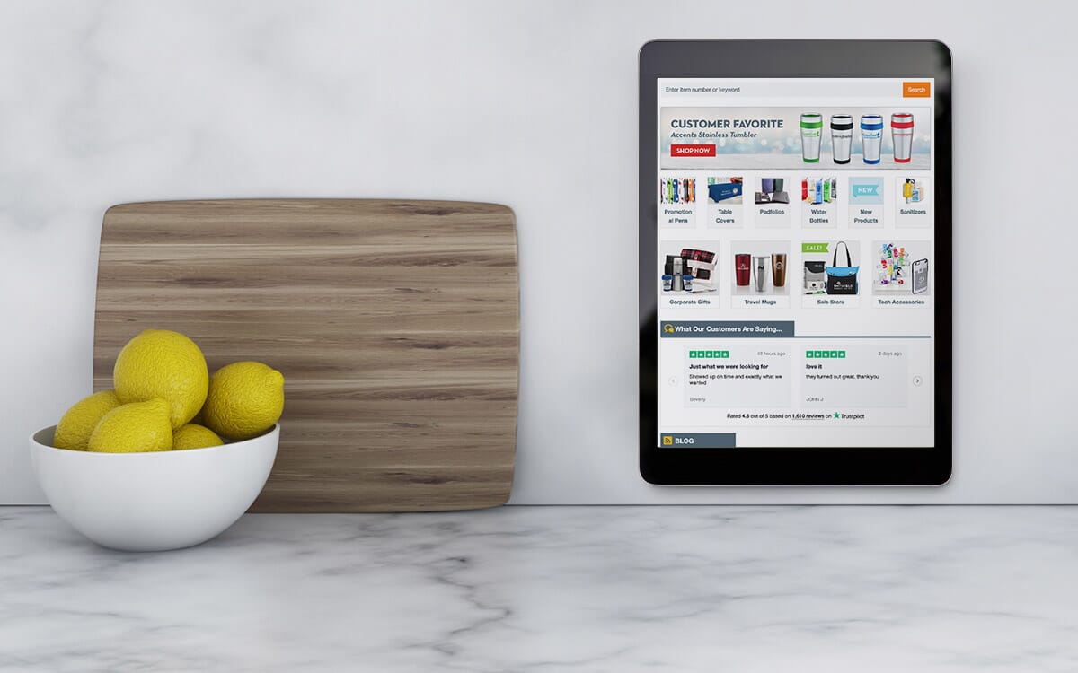 PopSocket holding ipad on kitchen wall