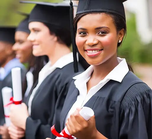 woman graduating with cap and gown