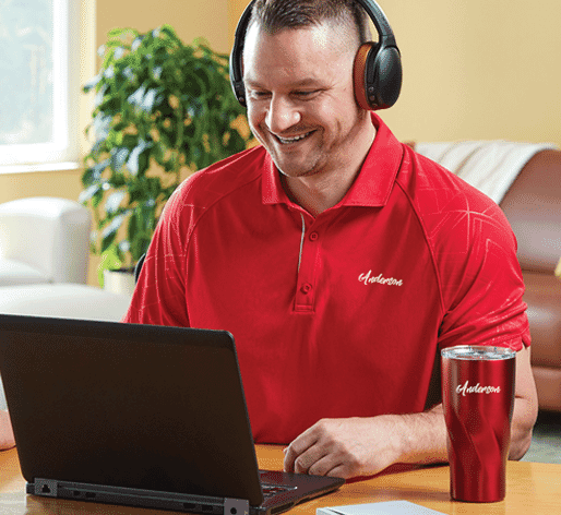 Employee working from home with corporate gear