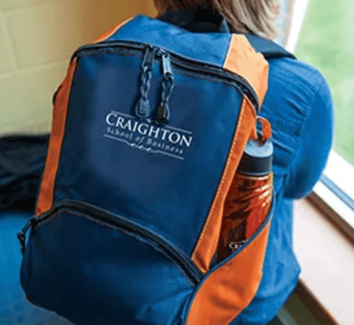 student with customized backpack and water bottle