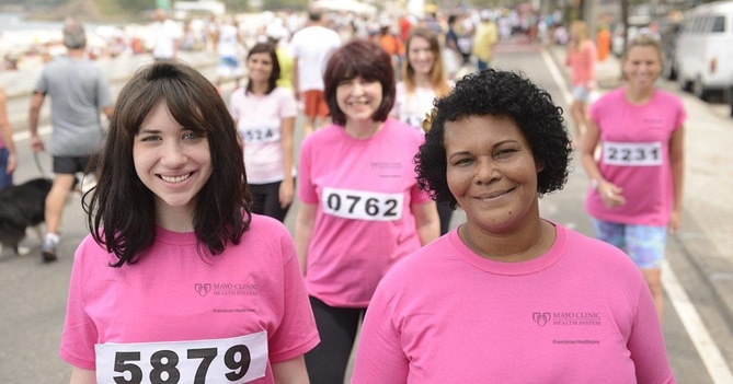 Breast cancer walkers in pink t-shirts