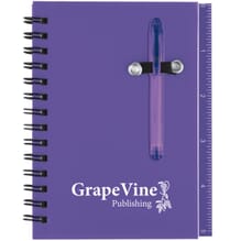 Purple spiral bound notebook with sticky notes