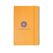 Yellow Moleskine notebook with purple logo