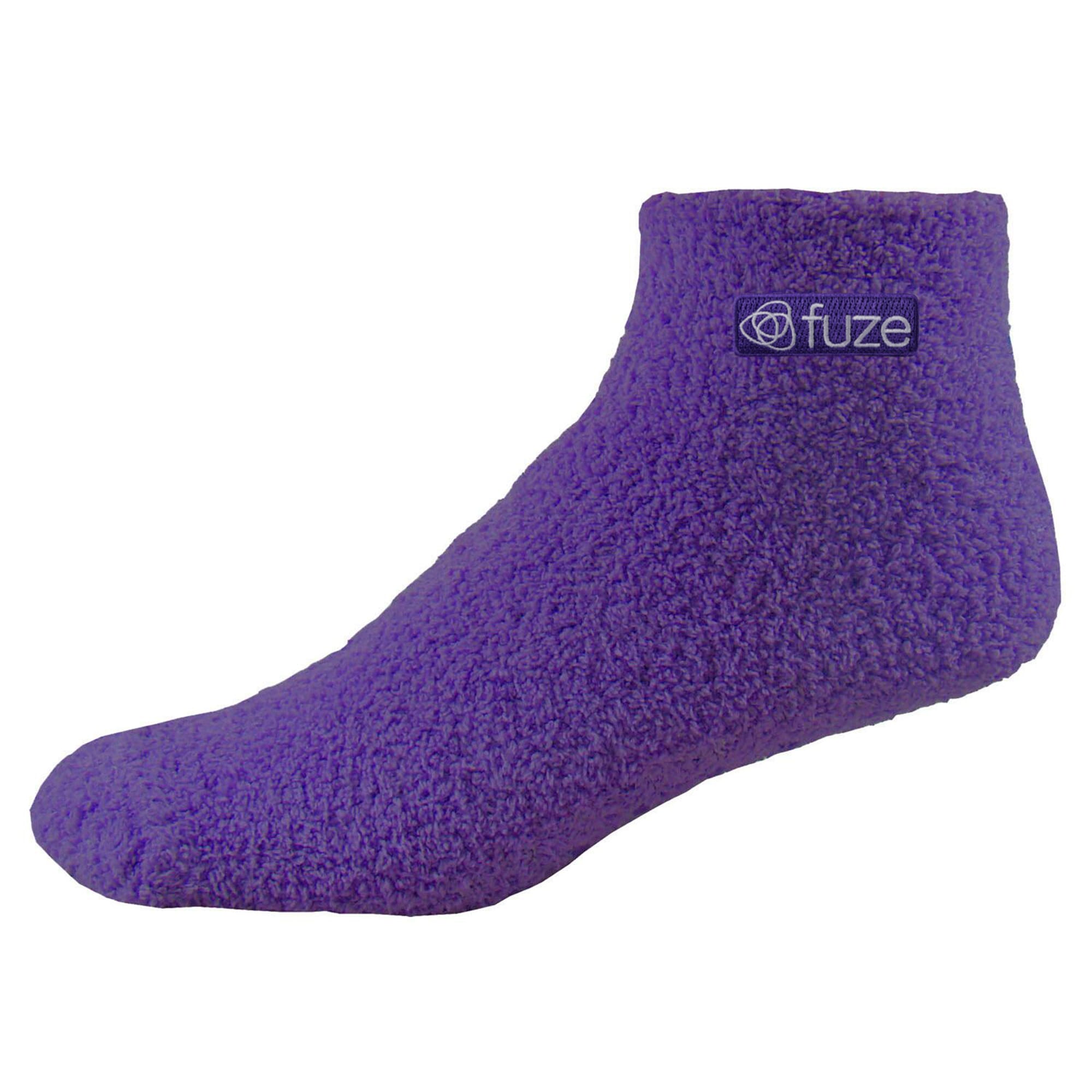 Fuzzy slippers with non-slip grips on sole