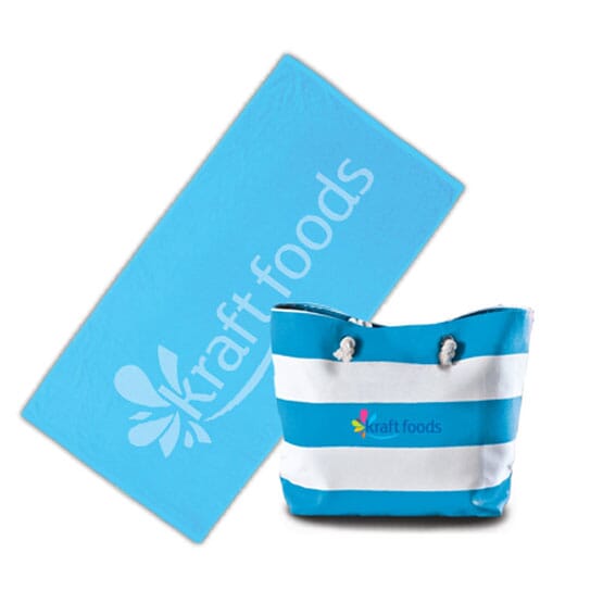 Blue and white striped beach bag with multicolored logo and a matching blue towel