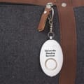 Key Chain hanging from purse