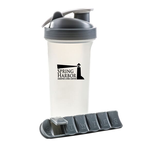 Flip top water bottle with with 7 day medicine container