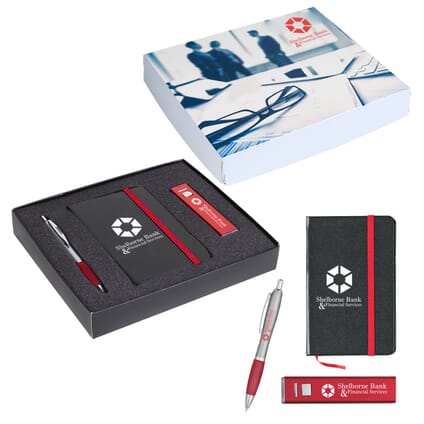 Black and red notebook, red and silver pen and a red and silver power bank, all with white logos