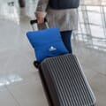 In use, attached to luggage