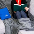 In use, blanket w/ pouch as foot warmer