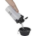 Carrier in use, pouring water